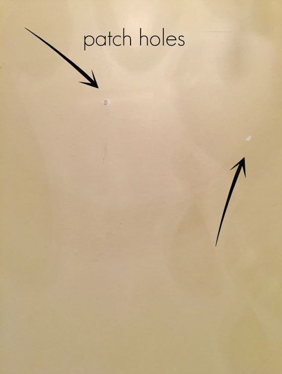 Patch Holes, arrows pointing to two holes in drywall