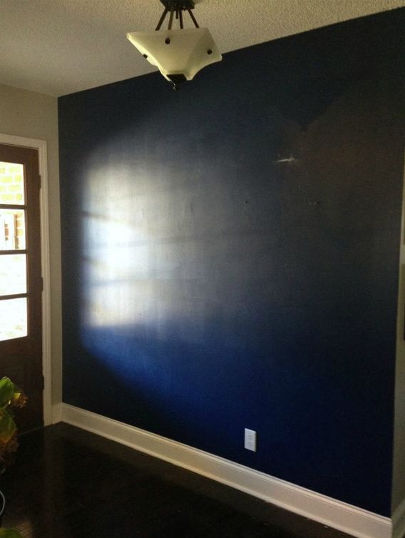 Dark Blue wall in entryway of a home