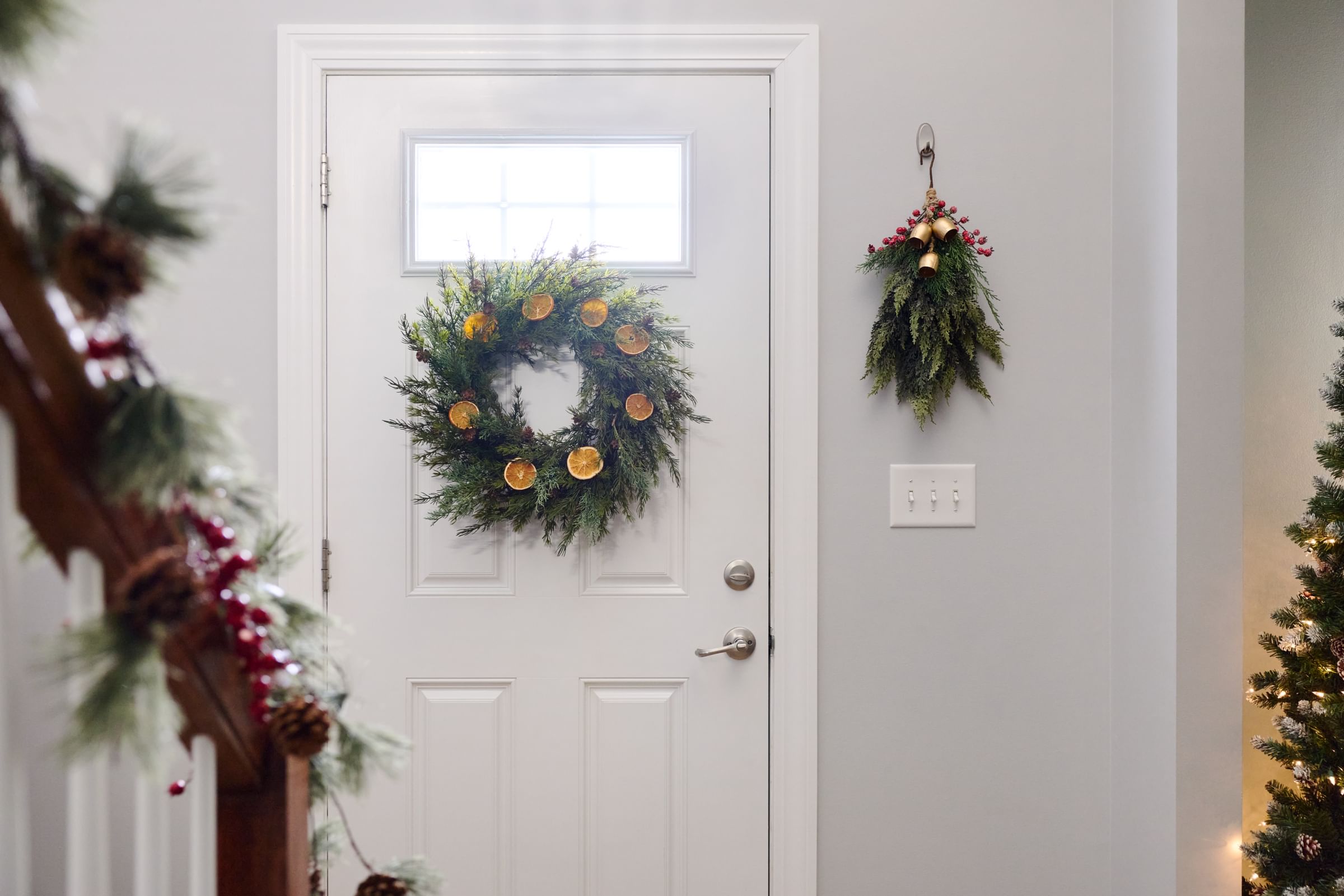 Holiday Wreath on the inside of a front door.