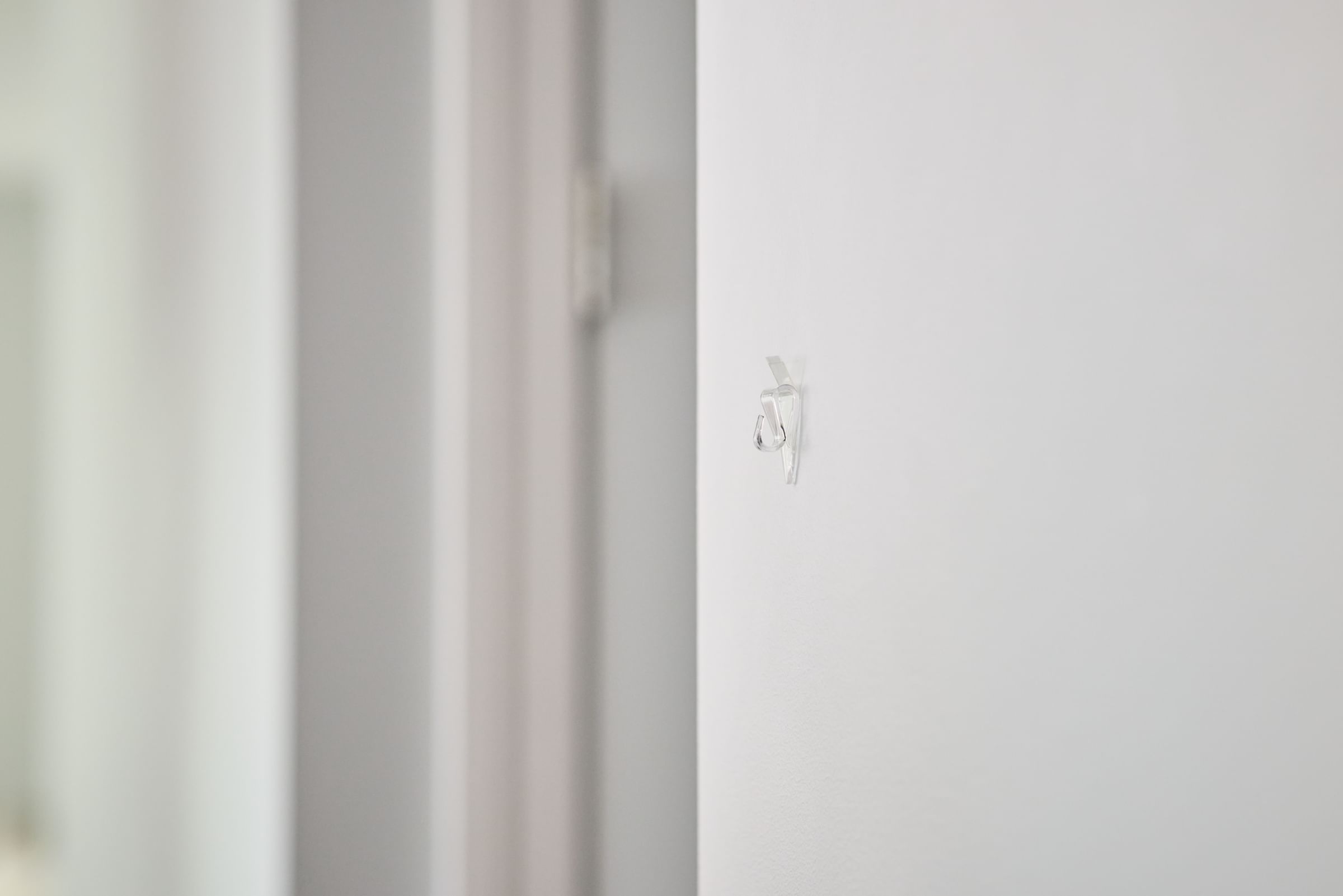 A FrogTape reMOVEables mini hook on a wall