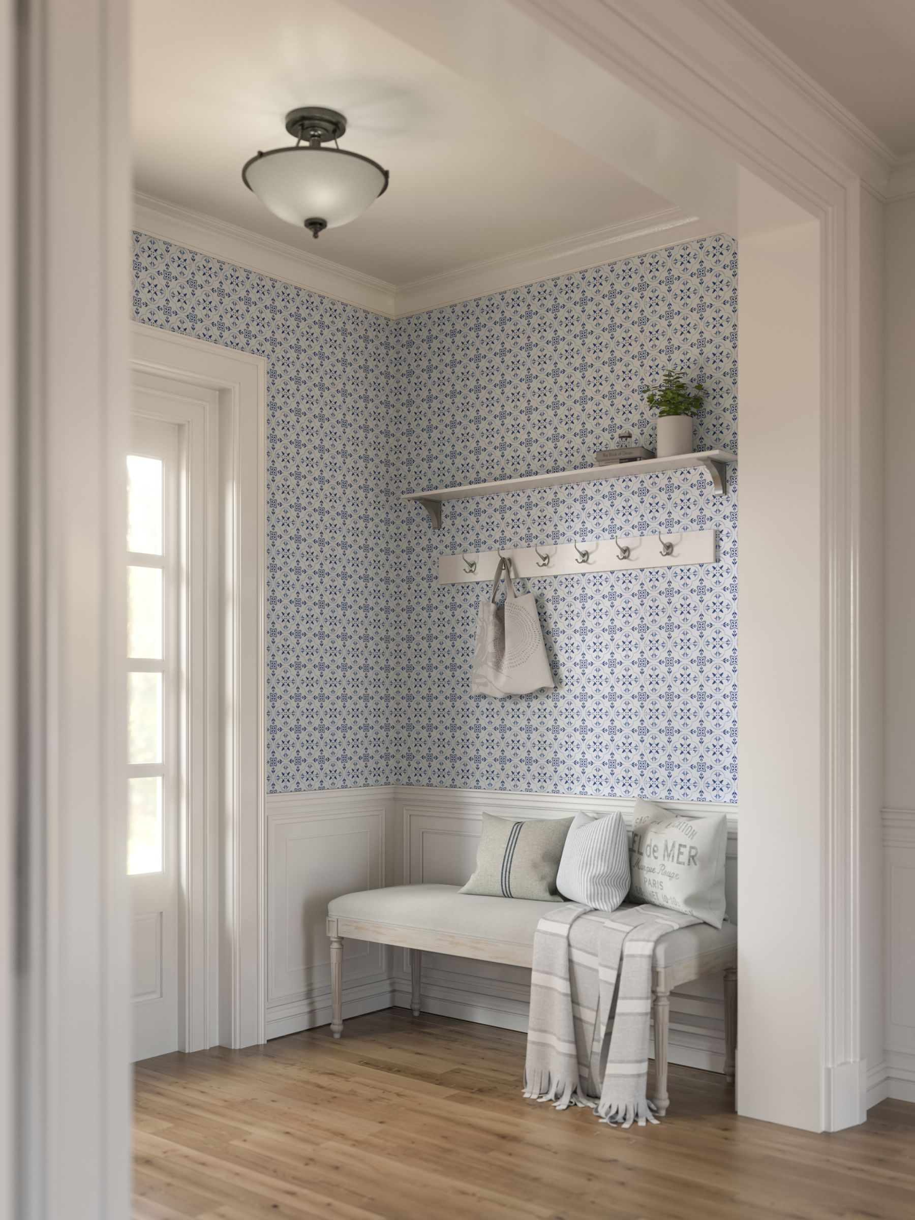 An entryway of a house with blue and white wallpaper.