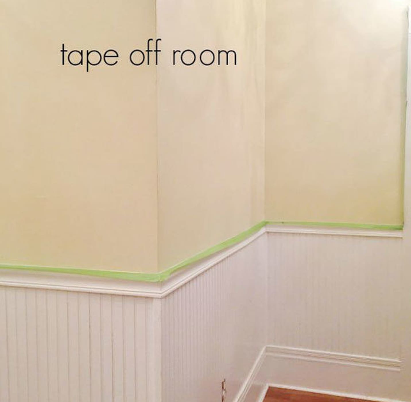 Tape off room, Green FrogTape Multi-Surface Painter's Tape taped on the trim near the middle of a wall between the wall and wainscotting.