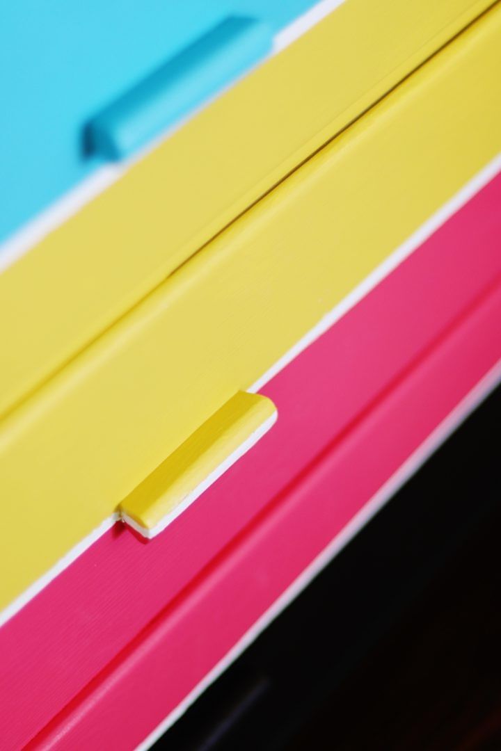 Blue, Yellow, Pink, and Black dresser drawers