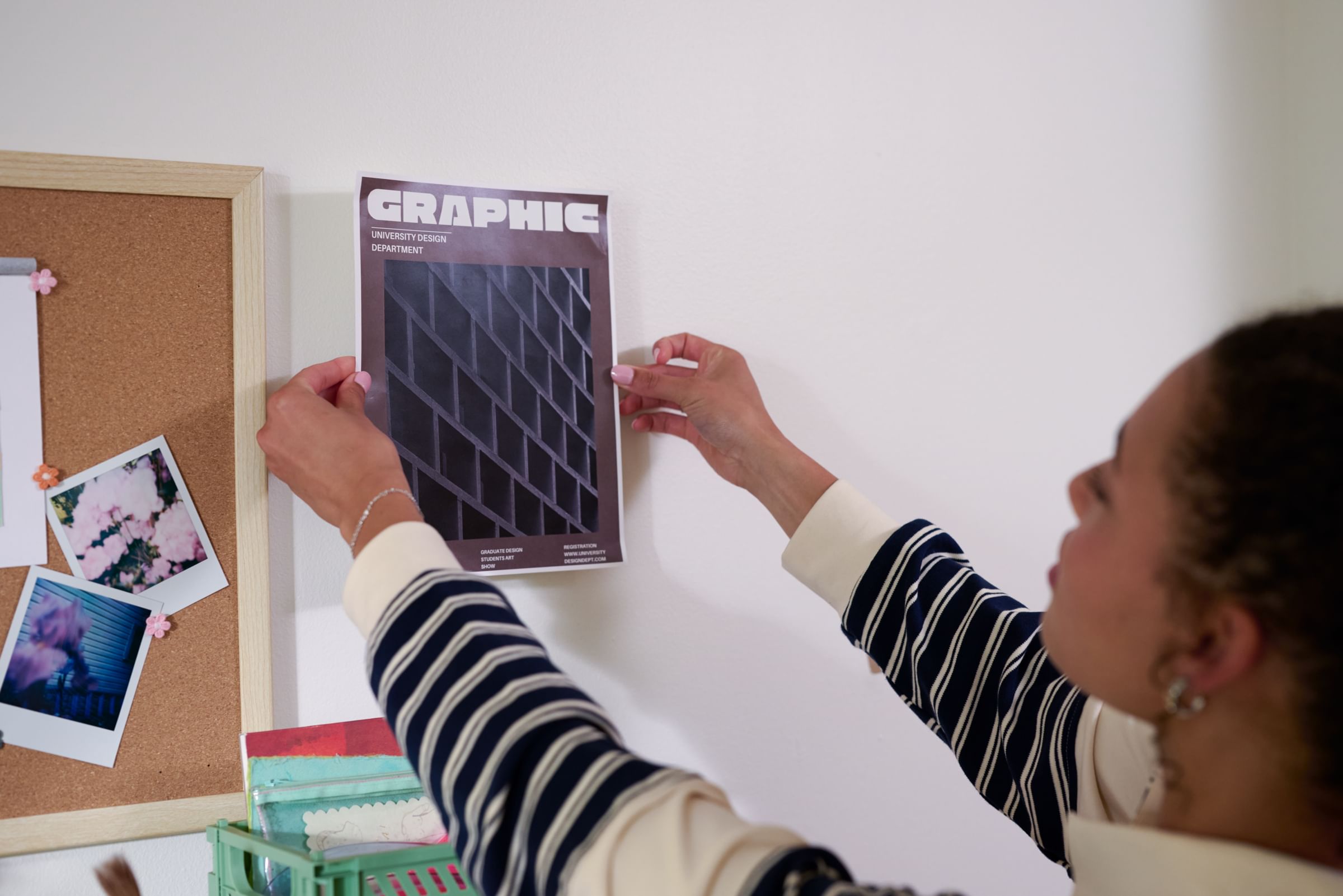 Graphic art poster mounted on a wall using FrogTape reMOVEables Poster Hanging Strips