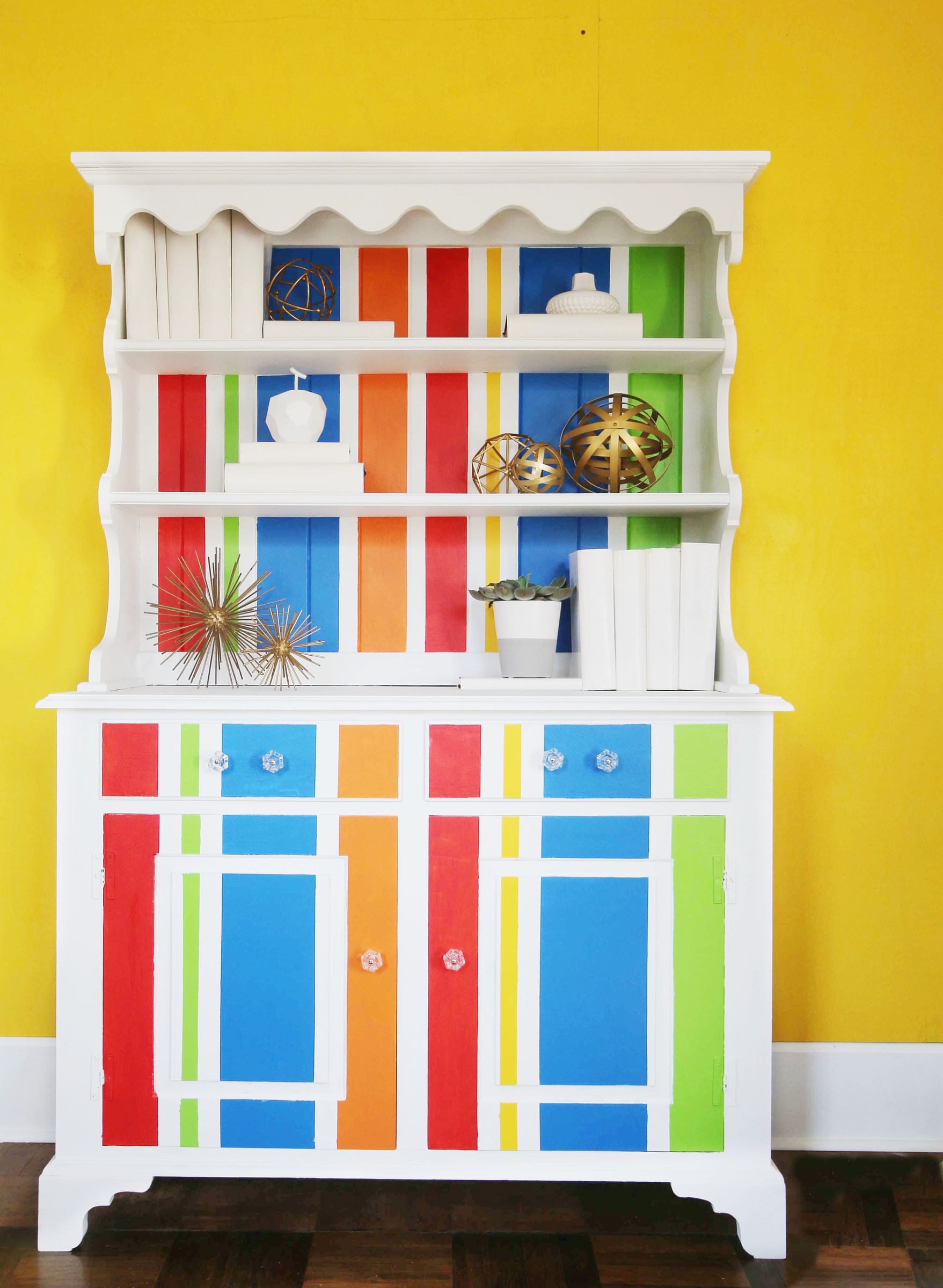 White Hutch with Red, Blue, Green, Yellow, and Orange stripes