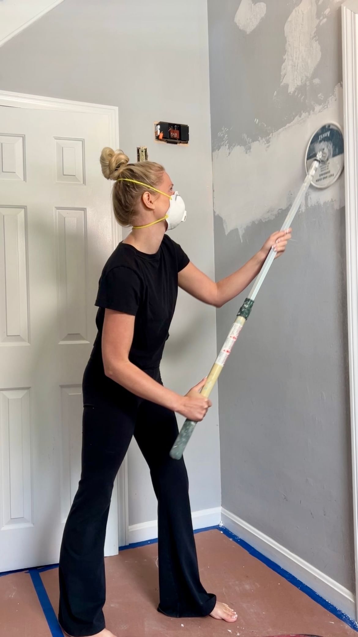 Haley Poole Prepping and Priming a wall