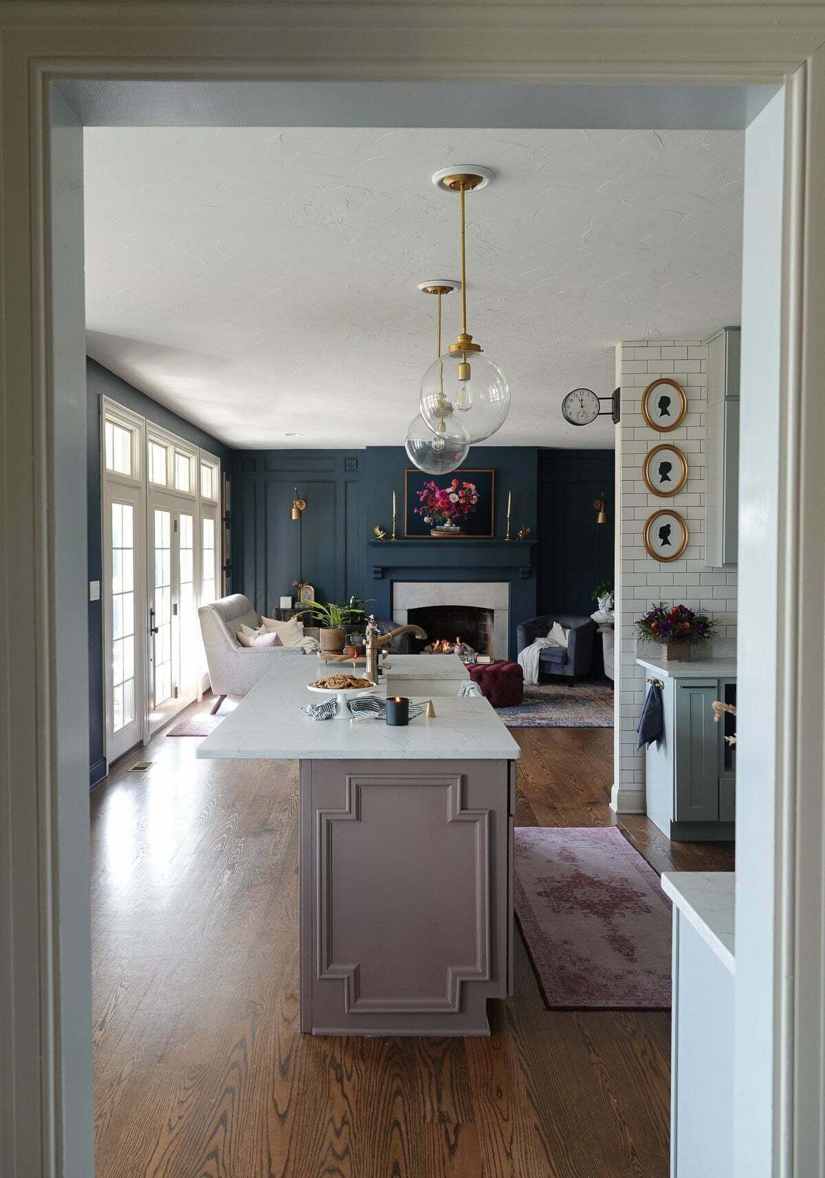 Finished space with purple kitchen island