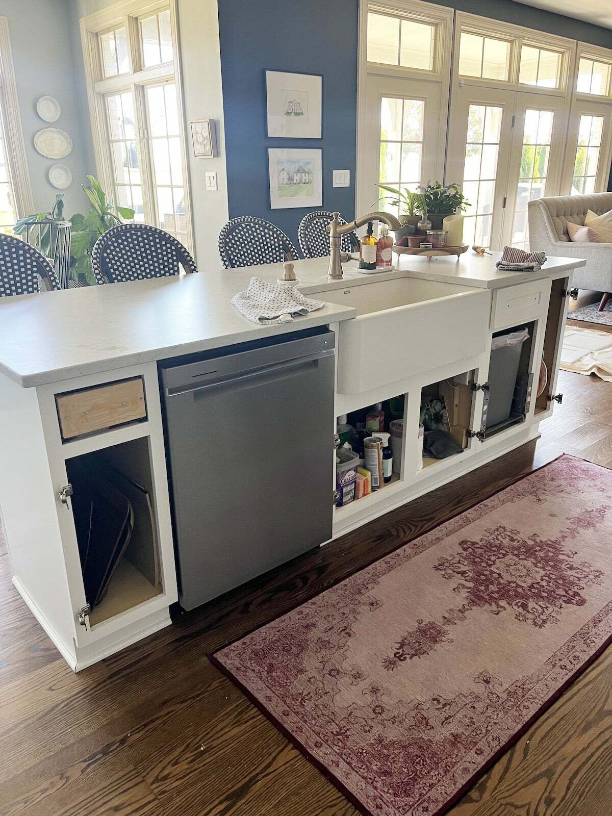 Primed kitchen island without doors