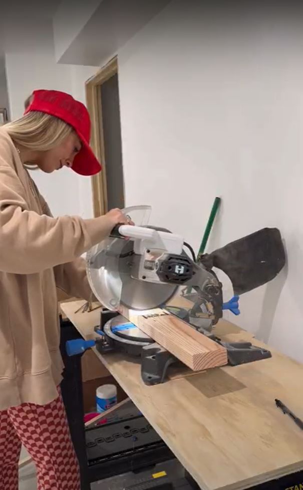 Sarah Merrell Cutting a Board