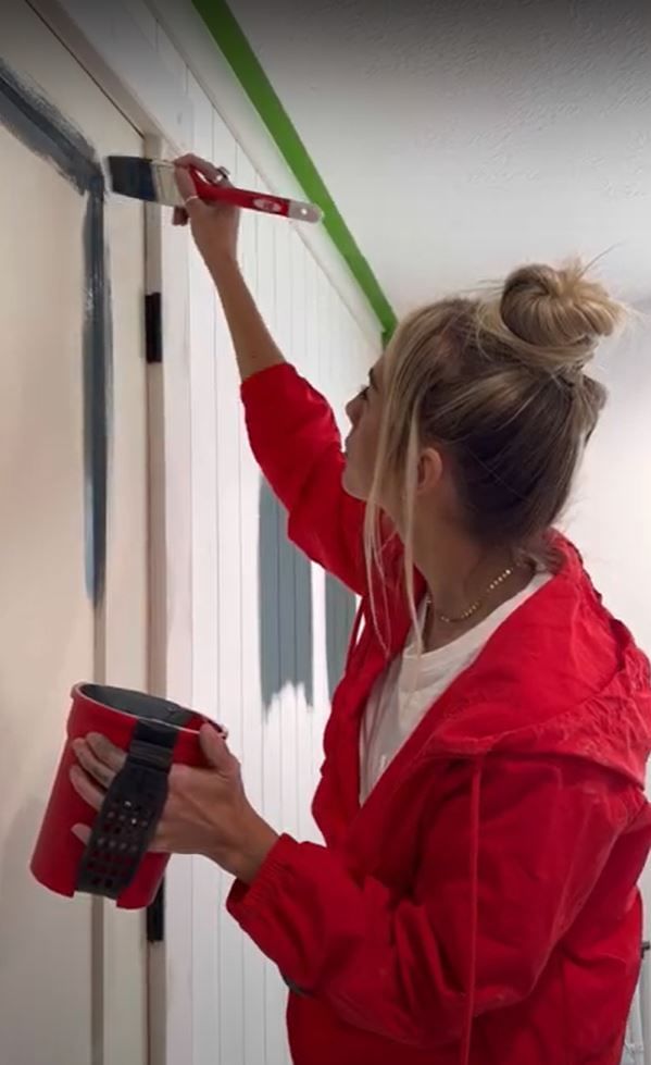 Sarah Merrell filling in nail holes