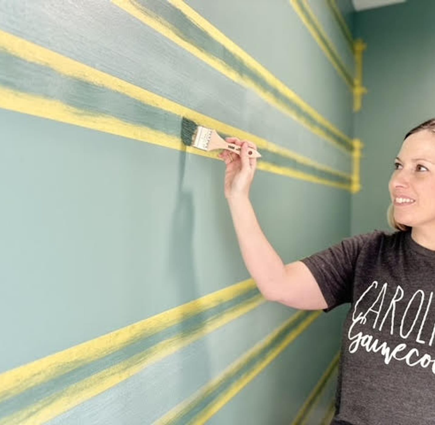 Katie Sharpe Painting horizontal lines